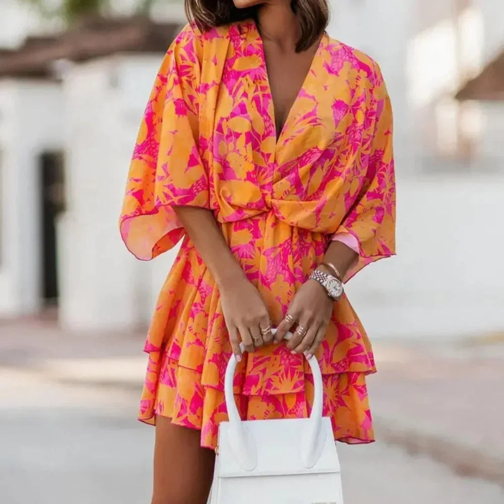 Sofie – Robe élégante avec jupe superposée et col en V