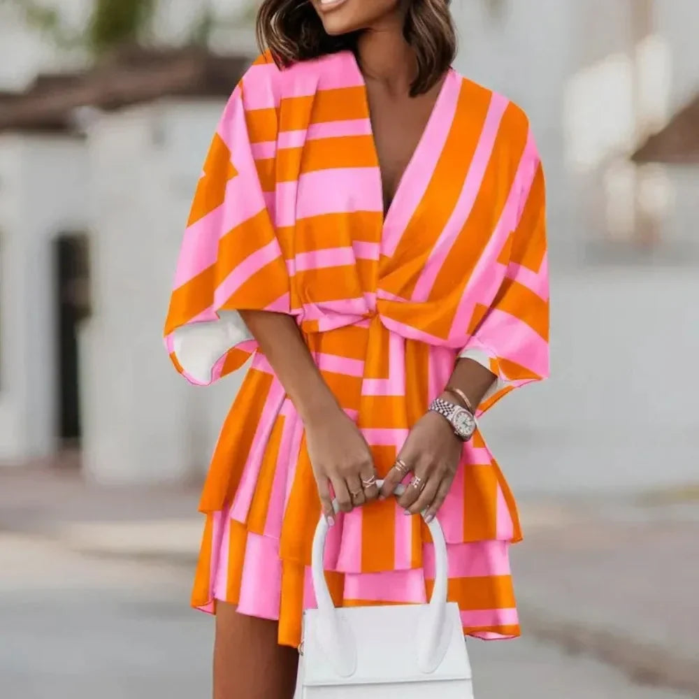 Sofie – Robe élégante avec jupe superposée et col en V