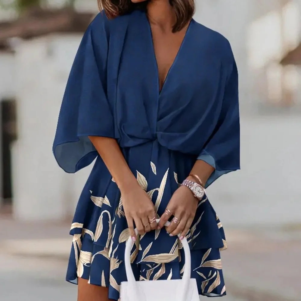 Sofie – Robe élégante avec jupe superposée et col en V