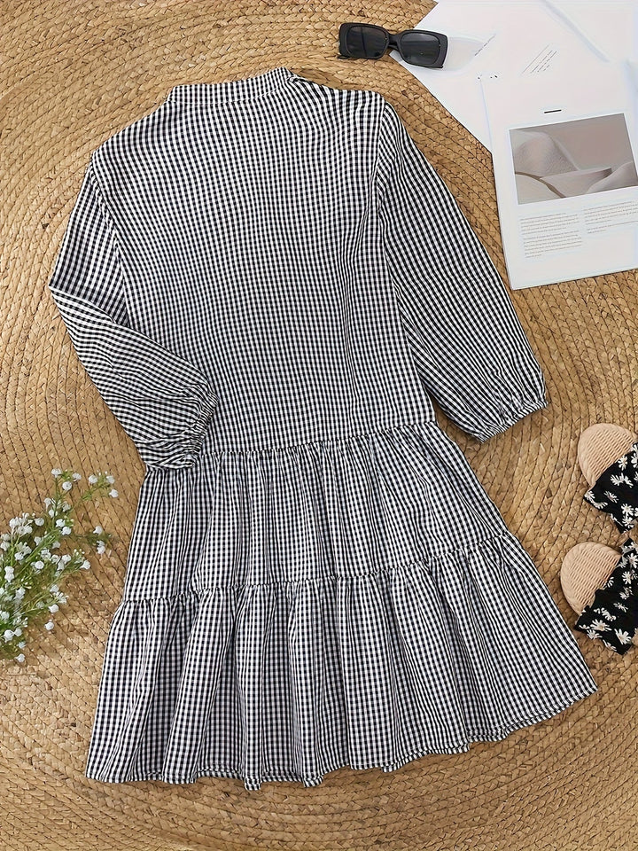 Maribel – Gestreepte midi-jurk met pofmouwen