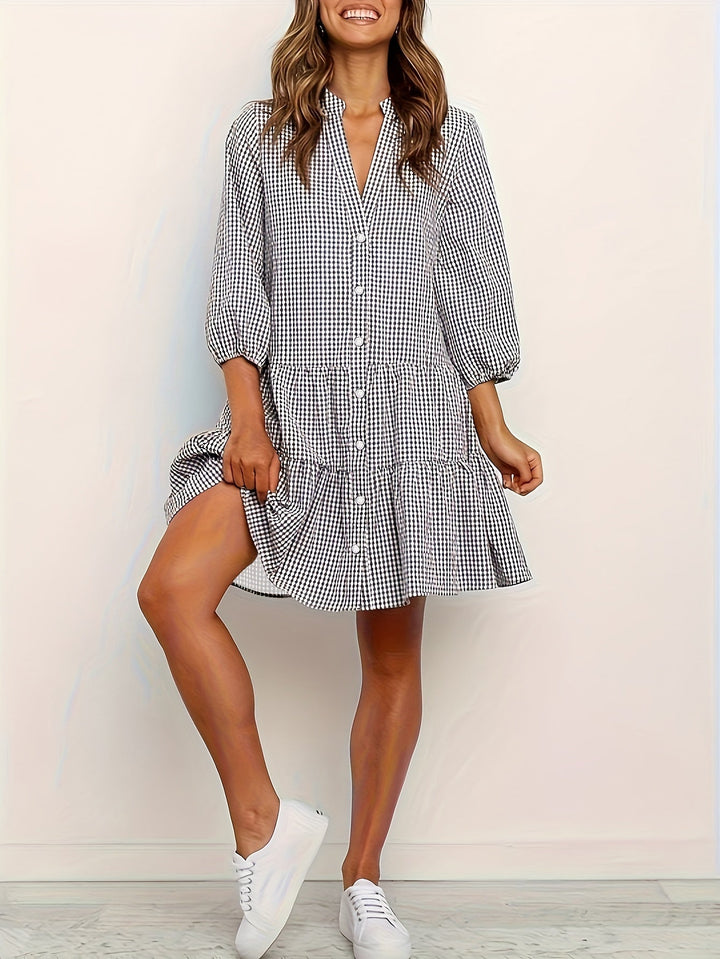 Maribel – Gestreepte midi-jurk met pofmouwen